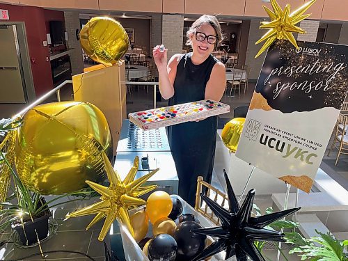 Ruth Bonneville / Free Press
LOCAL STDUP - Black Tie Bingo
Katherine Fox, CEO – Lubov SSMI Foundation sets bingo balls into their slots in their vintage bingo blower machine in preparation for their sold out Black Tie Bingo event later in the evening. The sold out event is taking place in their dining hall that has been transformed into a elegant hall where glamorous guests will play bingo with funds raised going toward enhancements for the residents entranceway of Holy Family Home.
Sept 25th, 2025