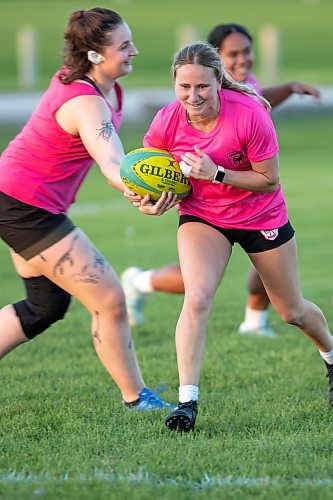 BROOK JONES/FREE PRESS
Wombats/Brombies Courtney Maines, 29, who plays the No. 10 position, is pictured running while carrying a rugby ball during a team practice at Maple Grove Rugby Park in Winnipeg, Man., Wednesday, Sept. 24, 2025. The Wombats/Brombies rugby team will be competing against the Assassins in the women's premier championship on Saturday.