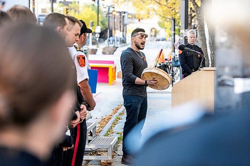 MIKAELA MACKENZIE / FREE PRESS

Damian Lawrenchuk sings at the Winnipeg Police Service sacred fire lighting celebration on Monday, Sept. 29, 2025. 

For Tyler story.
Free Press 2025