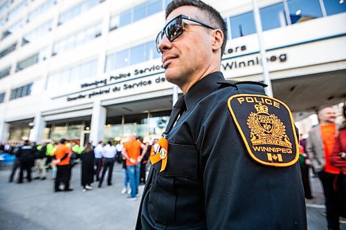 MIKAELA MACKENZIE / FREE PRESS

Staff segeant Shaun Venn wears a special orange badge at the Winnipeg Police Service sacred fire lighting celebration on Monday, Sept. 29, 2025. 

For Tyler story.
Free Press 2025