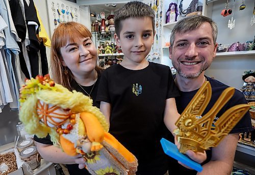 JOHN WOODS / FREE PRESS
Serhii and Yuliia Okhrimenko with son Maksym, who are from the Ukraine and are here because of their country&#x573; war with Russia, own the Kolo Shop and are photographed Monday, September 29, 2025. 

Reporter: dave