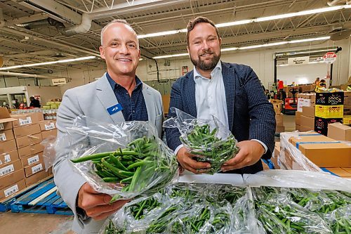 MIKE DEAL / FREE PRESS
Vince Barletta (right), President and CEO, Harvest Manitoba along with Barry Watson (left), area Vice-President, Corporate Financing and Senior Accounts at Western Canada for Farm Credit Canada (FCC) during an announcement at Harvest MB’s facilities (1085 Winnipeg Avenue) Wednesday morning, that FCC will be putting up $500,000 to help Harvest Manitoba expand.
Reporter: Tyler Searle
251001 - Wednesday, October 01, 2025.