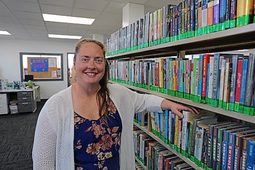 Laranda Bailey stands inside the Border Regional Library following renovations. (Connor McDowell/The Brandon Sun)