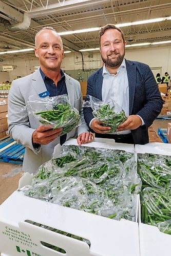 MIKE DEAL / FREE PRESS
Vince Barletta (right), President and CEO, Harvest Manitoba along with Barry Watson (left), area Vice-President, Corporate Financing and Senior Accounts at Western Canada for Farm Credit Canada (FCC) during an announcement at Harvest MB&#x2019;s facilities (1085 Winnipeg Avenue) Wednesday morning, that FCC will be putting up $500,000 to help Harvest Manitoba expand.
Reporter: Tyler Searle
251001 - Wednesday, October 01, 2025.