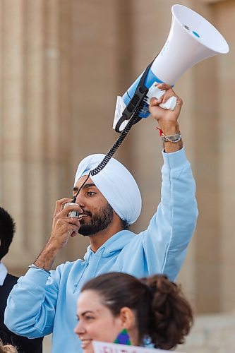 MIKE DEAL / FREE PRESS
The University of Manitoba Students&#x2019; Union held a rally at the Manitoba Legislative Building Wednesday afternoon calling on the provincial government to reinstate public healthcare coverage for international students in Manitoba.
Prabhnoor Singh, UMSU President (in light blue sweatshirt with mega phone) rallies the group gathered with a chant on the steps of the Legislative Building. 
Cindy Lamoureux, outgoing leader of the Manitoba Liberal Party was on hand to raise awareness for the healthcare coverage for international students.
Reporter: Maggie Macintosh
251001 - Wednesday, October 01, 2025.