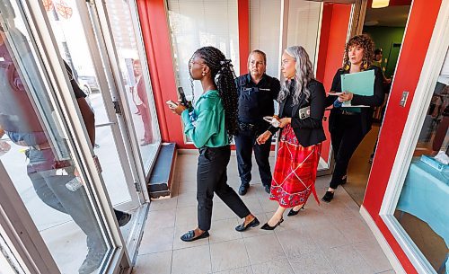 MIKE DEAL / FREE PRESS
Two officers with the provincial protective services escort Minister Fontaine as she leaves 510 Selkirk Street which will be the location of Mino&#x2019;Ayaawag Ikwewag Lodge.
Families Minister Nahanni Fontaine, minister responsible for women and gender equity announces that the Manitoba government will providing $3.5 million to Ikwe Widdjiitiwin Inc. to establish a first-of-its-kind 24-7 safe space for Indigenous women in Winnipeg.
The announcement took place at the future home of Mino&#x2019;Ayaawag Ikwewag Lodge, 510 Selkirk Avenue.
The lodge will provide immediate, short-term safety and stabilization for Indigenous women at risk of violence, homelessness or exploitation. It will provide low-barrier access to culturally safe crisis support.
Reporter: Tyler Searle
251002 - Thursday, October 02, 2025.