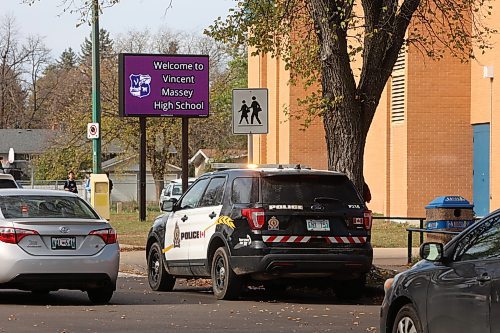 A Brandon Police Service vehicle is parked under the school sign after police responded to an "unverified threat." (Tim Smith/The Brandon Sun)