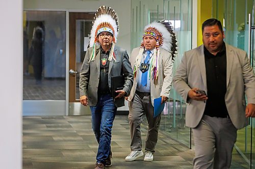 MIKE DEAL / FREE PRESS
Chief Dr. Stan Bird (left) of Peguis First Nation followed by Grand Chief of the Southern Chiefs&#039; Organization (SCO), Jerry Daniels (centre), on their way to the press conference. 
Chief Dr. Stan Bird of Peguis First Nation calls for the immediate termination of the coordination agreement that governs child and family services (CFS) in his community, citing grave risks to the safety and well-being of children and families, during a press conference Friday morning at the Southern Chiefs&#x2019; Organization (SCO) offices.
Grand Chief of the Southern Chiefs&#039; Organization (SCO), Jerry Daniels, was on hand to support Chief Dr. Stan Bird. 
Reporter: Nicole Buffie
251003 - Friday, October 03, 2025.