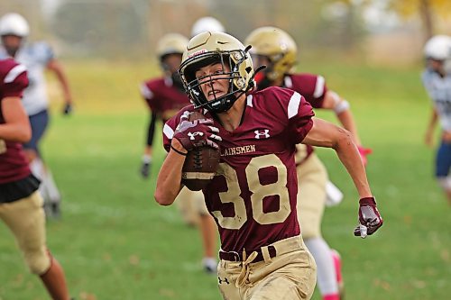 03102025
Eric Singfat #38 of the Crocus Plainsmen runs the ball during high school football action against the Grant Park Pirates at CPRSS on Friday afternoon. 
(Tim Smith/The Brandon Sun)