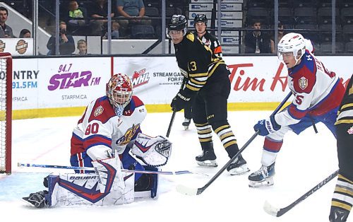 Edmonton Oil Kings goalie Parker Snell (80) has the puck drop below the logo on his jersey after making a save as Brandon Wheat Kings forward Jordan Gavin (13) and Oil Kings defenceman Noa Ta'amu (5) look on during Western Hockey League action at Assiniboine Credit Union Place on Saturday. (Perry Bergson/The Brandon Sun)
Oct. 4, 2025