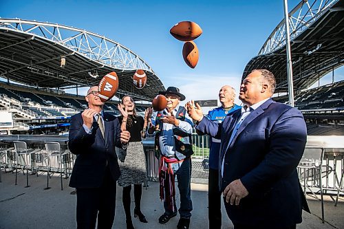 MIKAELA MACKENZIE / FREE PRESS

Mayor Scott Gillingham (left), minister of education Tracy Schmidt, MMF minister of youth and sport Richard Genaille, Travel Manitoba president and CEO Colin Ferguson, and Winnipeg Football Club president and CEO Wade Miller at a Grey Cup festival announcement at Princess Auto Stadium on Monday, Oct. 6, 2025. 

For sports story.
Free Press 2025