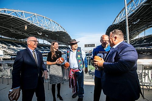MIKAELA MACKENZIE / FREE PRESS

Mayor Scott Gillingham (left), minister of education Tracy Schmidt, MMF minister of youth and sport Richard Genaille, Travel Manitoba president and CEO Colin Ferguson, and Winnipeg Football Club president and CEO Wade Miller at a Grey Cup festival announcement at Princess Auto Stadium on Monday, Oct. 6, 2025. 

For sports story.
Free Press 2025