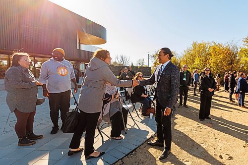 MIKE DEAL / FREE PRESS
Premier Wab Kinew arrives and starts to chat with attendees to the event prior to the announcement. 
Premier Wab Kinew along with Environment and Climate Change Minister Mike Moyes unveil Manitoba&#x2019;s Path to Net Zero during an event at Fort Whyte Alive, 2505 McGillivray Blvd. Monday morning.
Reporter: JS Rutgers
251006 - Monday, October 06, 2025.
