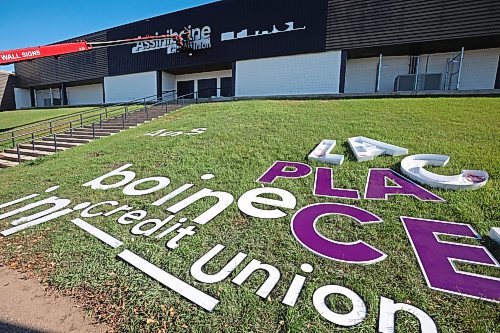 07102025
A worker with Off The Wall Signs installs the new lettering for Assiniboine Credit Union Place on the west side of the arena on Tuesday. 
(Tim Smith/The Brandon Sun)