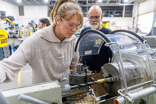 MIKE DEAL / FREE PRESS
Samantha Law makes a brass ring on a lathe while being supervised by Industrial Mechanic / Millwright instructor, Mike Williams during the MITT LauncHER into Trades event where women who are 18 and older have an opportunity to explore the trades at the MITT Henlow Bay campus.
251008 - Wednesday, October 08, 2025.