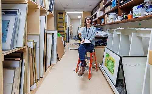 MIKE DEAL / FREE PRESS
hannah_g the curator for the Buhler Gallery at the St. Boniface Hospital in the storage facility for the gallery.
Reporter: AV Kitching
251009 - Thursday, October 09, 2025.