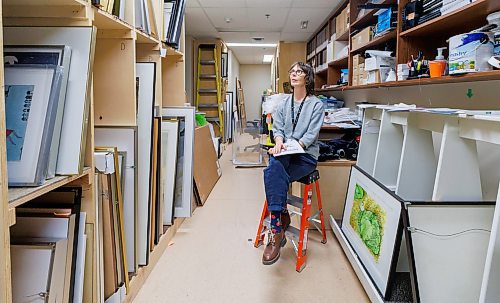 MIKE DEAL / FREE PRESS
hannah_g the curator for the Buhler Gallery at the St. Boniface Hospital in the storage facility for the gallery.
Reporter: AV Kitching
251009 - Thursday, October 09, 2025.