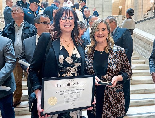 Ruth Bonneville / Free Press 
LOCAL - Order of the Buffalo Hunt 
Photo of Kristin Hayward, assistant deputy minister for the Manitoba Wildfire Service (left), and Christine Stevens, assistant deputy minister for the Manitoba Emergency Management Organization, hold the Order of the Buffalo Hunt awarded to them both by the Premier of Manitoba in a ceremony earlier for guiding the province through one of its most difficult wildfire seasons, at a special ceremony at the Legislative Building Thursday.  
They had their photo taken with a larger group of heroes who also were recognized for their emergency work helping with the  Manitoba Wildfires this past summer. 
Hayward and Stevens, are two of  Manitoba’s top emergency leaders that were recognized for guiding the province through one of its most difficult wildfire seasons in recent years.
Oct 09, 2025