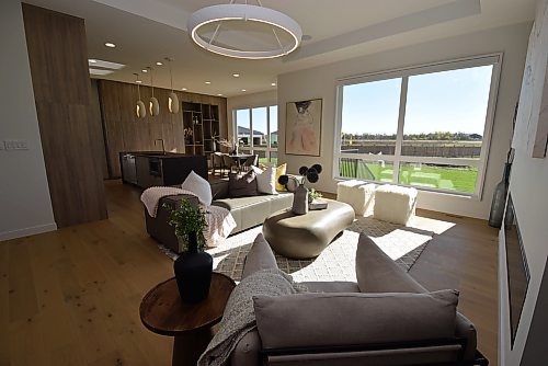 Todd Lewys / Free Press
To large windows on the home&#x2019;s rear wall allow tons of natural light to stream into the free flowing main living area.