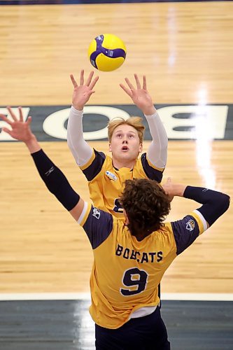 Kale Fisher sets the ball to Riley Brunet (9) during a pre-season match at home last month. Both could be in line for a big jump in playing time this year. (Tim Smith/The Brandon Sun)