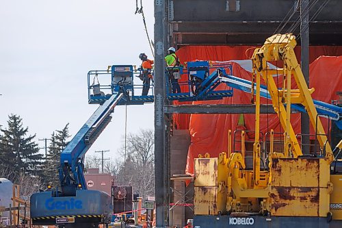 MIKE DEAL / FREE PRESS
With construction workers going about their business, Federal Minister Terry Duguid, Minister of Sport and Minister responsible for Prairies Economic Development Canada and Mayor Scott Gillingham gathered to at the Winnipeg North End Sewage Treatment Plant for an infrastructure announcement Monday morning.
Reporter: Joyanne Pursaga
250303 - Monday, March 03, 2025.