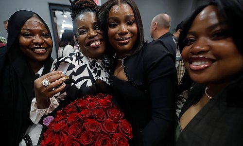 JOHN WOODS / FREE PRESS
Ifunanya Nwannemelu, centre right, celebrates with her aunt Jacintha Anyadike, centre left, and her friends Faridat Yusuf, left, and Karen Christopher after she received her graduating pin during the RRC Polytech bachelor of nursing graduates pinning ceremony Tuesday, October 14, 2025 at the Victoria Inn.

Reporter: ?