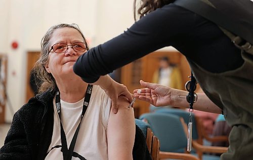 Ruth Bonneville / Free Press 
LOCAL - vaccine clinic 
Lise Labelle gets a vaccine  at Acorn Family Place Tuesday. 
The WRHA holds media event with Dr. Bunmi Fatoye, WRHAMedical Officer of Health on vaccines at Acorn Family Place on Tuesday.
Oct 14, 2025