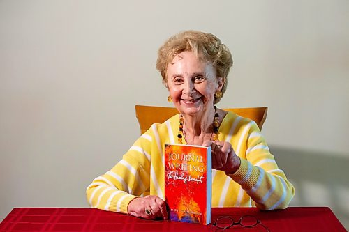 BROOK JONES/FREE PRESS
Winnipeg resident Judy Goodman, 82, who has been journaling since she was 12 years old, holds a copy of a book she wrote entitled Journal Writing: The Healthy Benefits. Goodman was pictured at her home in Winnipeg, Man., Wednesday, Oct. 15, 2025.