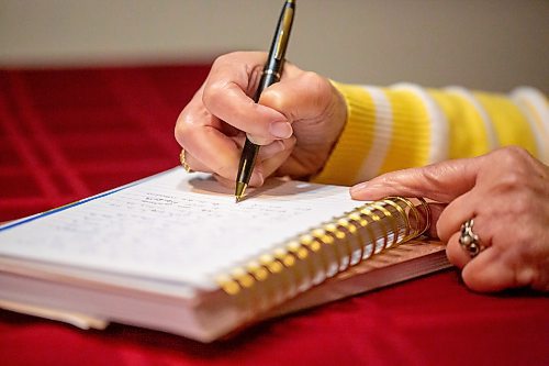 BROOK JONES/FREE PRESS
Winnipeg resident Judy Goodman, 82, who has been journaling since she was 12 years old, writes in her journal while she is pictured in her home in Winnipeg, Man., Wednesday, Oct. 15, 2025.