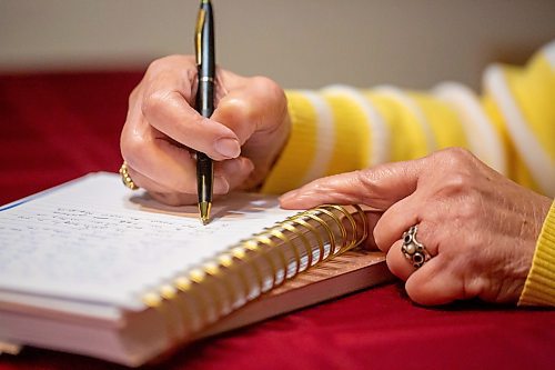 BROOK JONES/FREE PRESS
Winnipeg resident Judy Goodman, 82, who has been journaling since she was 12 years old, writes in her journal while she is pictured in her home in Winnipeg, Man., Wednesday, Oct. 15, 2025.