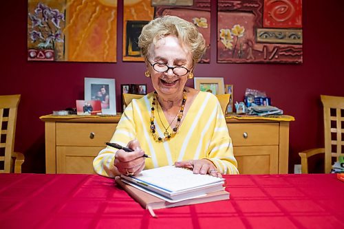 BROOK JONES/FREE PRESS
Winnipeg resident Judy Goodman, 82, who has been journaling since she was 12 years old, smiles while she writes in her journal as she is pictured in her home in Winnipeg, Man., Wednesday, Oct. 15, 2025.