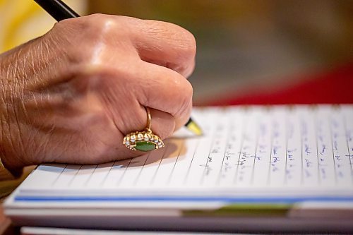 BROOK JONES/FREE PRESS
Winnipeg resident Judy Goodman, 82, who has been journaling since she was 12 years old, writes in her journal while she is pictured in her home in Winnipeg, Man., Wednesday, Oct. 15, 2025.