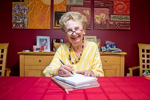 BROOK JONES/FREE PRESS
Winnipeg resident Judy Goodman, 82, who has been journaling since she was 12 years old, smiles while she writes in her journal as she is pictured in her home in Winnipeg, Man., Wednesday, Oct. 15, 2025.