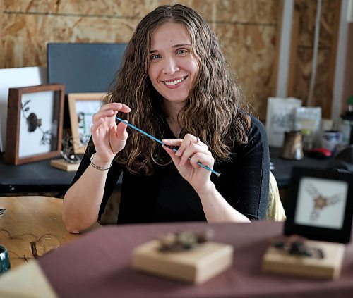 Ruth Bonneville / Free Press
49.8 - Creators
Photos of local artist, Sandra Klowak with Corporeal Curios, who creates artwork from hair, in her studio with samples of her work.
Story: Sandra Klowak creates artwork from hair for clients who donate hair of their loved ones who have died. It’s a form of sculpture which originated in the Victorian era.
Klowak has recently begun incorporating teeth – donated from friends and family members – into her personal artwork.
Oct 15, 2025
