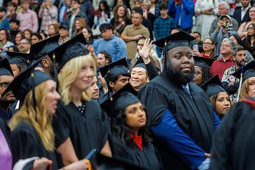 MIKE DEAL / FREE PRESS
Jianbo Wang waves to family and friends before receiving a Master’s in Management degree.
Graduates along with friends and family attend the University of Winnipeg’s 127th fall Convocation at Duckworth Centre Friday morning.
Along with celebrating the work of students, staff and faculty the University bestowed an honourary doctorate on Scott Oake.
Standup
251017 - Friday, October 17, 2025.