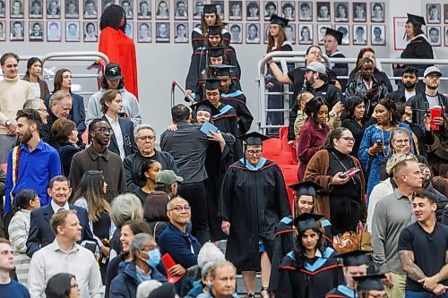 MIKE DEAL / FREE PRESS
A student gets a quick hug as they enter the building, filing past family and friends on their way to becoming graduates.
Graduates along with friends and family attend the University of Winnipeg’s 127th fall Convocation at Duckworth Centre Friday morning.
Along with celebrating the work of students, staff and faculty the University bestowed an honourary doctorate on Scott Oake.
Standup
251017 - Friday, October 17, 2025.