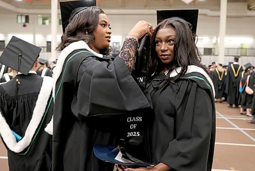 Ruth Bonneville / Free Press
Local standup - UM Fall Convocation 2025
Precious Ugbo (left) and Ayomide Orogun finish dressing up in their cap and gown just prior receiving their Batchelor of Nursing degree at their graduation ceremony at the Fort Garry Campus Tuesday.
Oct 21, 2025