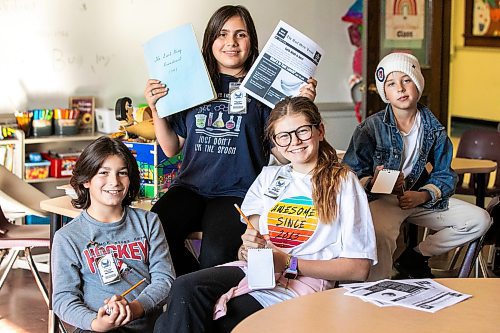 MIKAELA MACKENZIE / FREE PRESS
Earl Grey Press reporters Sebastian (11, left), Isabel (11), Willow (12), and James (10) at Earl Grey School on Thursday, Oct. 23, 2025. 
For Melissa story.
Free Press 2025