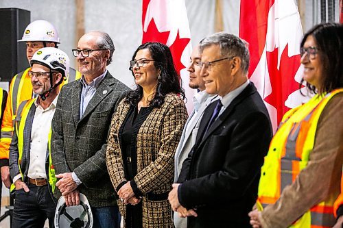 MIKAELA MACKENZIE / FREE PRESS
Rebeccaʃhartrand, minister of northern affairs, poses for a group photo at the under-construction Wehwehneh Bahgahkinahgohnʢuilding on Friday, Oct. 24, 2025. 
For Tyler/feature story.
Free Press 2025