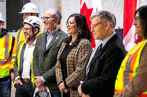 MIKAELA MACKENZIE / FREE PRESS
Rebeccaʃhartrand, minister of northern affairs, poses for a group photo at the under-construction Wehwehneh Bahgahkinahgohnʢuilding on Friday, Oct. 24, 2025. 
For Tyler/feature story.
Free Press 2025