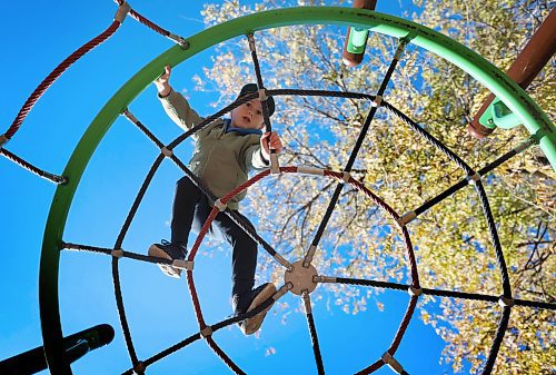 Ruth Bonneville / Free Press 
Standup - Navigating the Web
Four-year-old Jacob Cramer makes his way up and around a giant web which is part of a play structure at T. R> Hodgson Park on Carpathia St. while hanging out at the park with his mom Friday afternoon.  
Oct 24, 2025