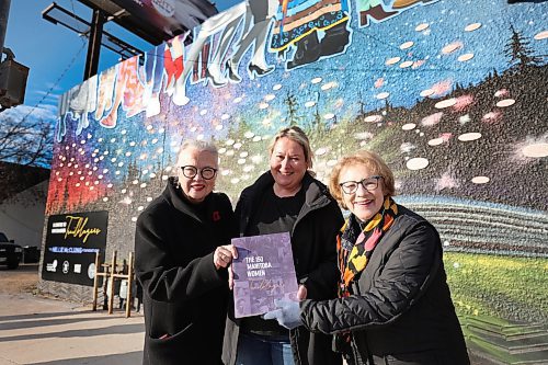 Ruth Bonneville / Free Press 
LOCAL STDUP - McClung stdup
Photo of mural artist Mandy Van Leeuwen (centre) with two members of the Nellie McClung Society Doris Mae Oulton (left) and Lila Goodspeed Everett celebrating the unveiling of the new mural celebrating Manitoba Women. 
A beautiful mural dedicated to the Nellie McClung Foundation and 150 inspiring women  was unveiled outside of Charitos Salon on the corner of Arlington and Sargent with Tom Ethans, Executive Director of Take Pride Winnipeg Inc.Winnipeg Friday. 
Oct 24, 2025