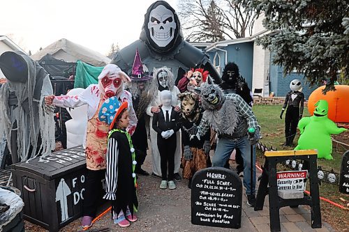 The Scare team pose for a picture during their third haunted house, tagged "Scare the Hunger" at Cedar Bay on Sunday evening. The Scare Away Hunger attraction at Cedar Bay surpassed its 1,500-item food donation goal for Samaritan House Ministries. (Abiola Odutola/The Brandon Sun)