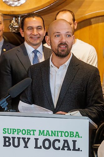 MIKE DEAL / FREE PRESS
Michael Mikulak, executive director, Food and Beverage Manitoba, speaks during the announcement by Premier Wab Kinew that the government launches a new advertising campaign, “Support Manitoba. Buy Local.” at Low Life Barrel House, 398 Daly Street North, Wednesday afternoon.
Reporter: Tyler Searle
250205 - Wednesday, February 05, 2025.