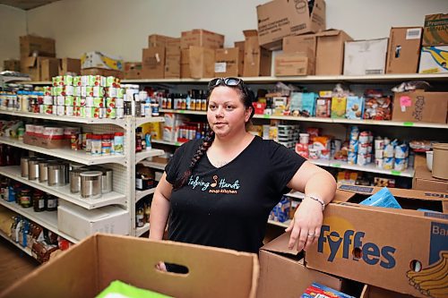 28102025
Angela Braun, executive director of Helping Hands Centre of Brandon, Inc. inside a stocked pantry at the local soup kitchen on Tuesday. The organization has seen up to a 15% increase in reliance on their services. (Tim Smith/The Brandon Sun)