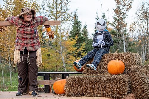BROOK JONES/FREE PRESS
The Assiniboine Park Conservancy hosts Boo at the Zoo as the Assiniboine Park Zoo has been transformed into the mysterious and magical town of Spookyville. Pictured: Connor Kostynuik, 6, (right) who is dressed as movie character Jack Skellington from The Nightmare Before Christmas while he interacts with Sam Starek, 18, who is dressed as a scarecrow in Patch &amp; Jack Lane during Boo at The Zoo in Winnipeg, Man., Wednesday, Oct. 29, 2025.