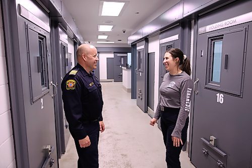 30102025
Brandon Fire and Emergency Services Chief Terry Parlow and Kaitlyn May, a primary care paramedic with Brandon Fire and Emergency Services, chat in the Brandon Police Services detention centre on Thursday.
(Tim Smith/The Brandon Sun)
