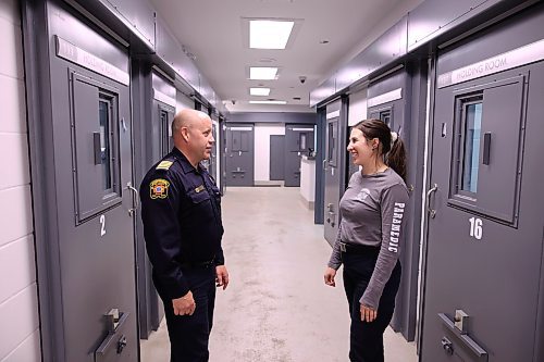 30102025
Brandon Fire and Emergency Services Chief Terry Parlow and Kaitlyn May, a primary care paramedic with Brandon Fire and Emergency Services, chat in the Brandon Police Services detention centre on Thursday.
(Tim Smith/The Brandon Sun)