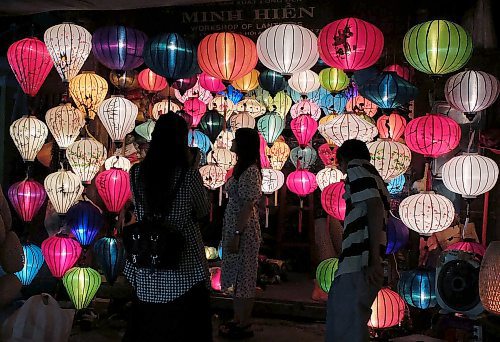 JASON HALSTEAD / FREE PRESS
People look at paper lanterns in a shop in Hoi An, Vietnam. The nation now ranks as the third-most-visited country in Southeast Asia.