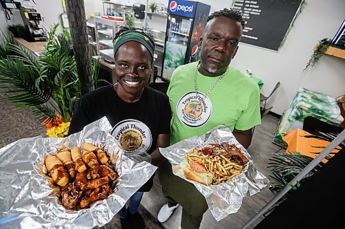 JOHN WOODS / FREE PRESS
Donna Taylor, Social Marketing Manager, and Vincent Dennis, owner of Tropical Thunder House of Jerk - Jamaican/Italian restaurant, prepares a Rocka Bessa burger and T.T. Wings in his restaurant in the West St. Paul Curling Club Tuesday, November 4, 2025. 

Reporter: dave